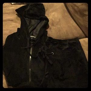 Black velour lounge pant and hooded zip up jacket.